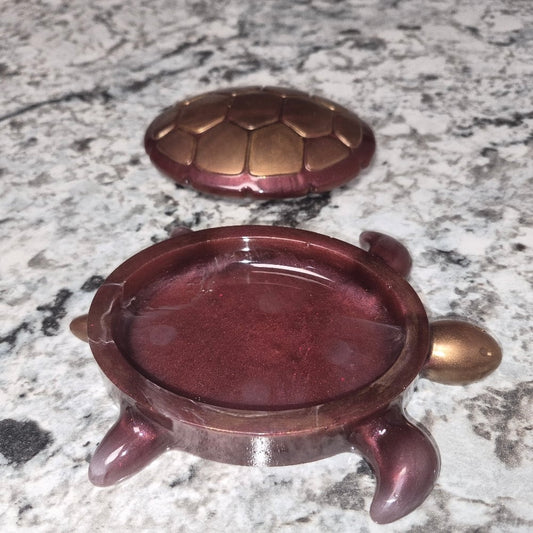 Maroon and gold turtle jar